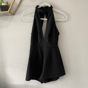 Tobi Black Romper with deep V, choker and open back